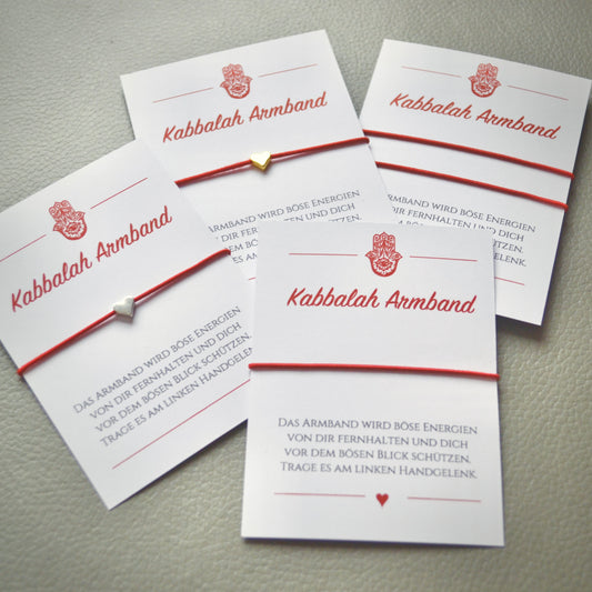 Handgefertigtes Kabbalah Armband mit rotem Band und Herz in Gold oder Silber als spirituelles Schutzarmband gegen den bösen Blick – Geschenk für Frauen und Männer.